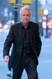 Slender Michael Douglas returns to his NYC Apartment