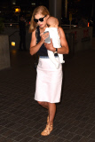 Rosamund Pike all smiles carrying baby Atom through LAX **NO UK**