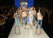 Gisele Bundchen, 34, walks down the catwalk one last time
