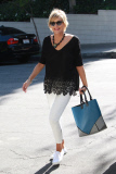 *EXCLUSIVE* Sharon Stone takes blue and gray Color Block tote to Sunset Marquis