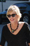 *EXCLUSIVE* Sharon Stone takes blue and gray Color Block tote to Sunset Marquis