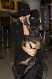 Lady Gaga pushes the fashion limits at LAX Airport with her dog