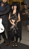 Lady Gaga pushes the fashion limits at LAX Airport with her dog