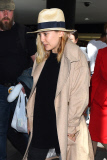 Aaron Taylor Johnson and his wife get set to catch a flight out of LAX **NO UK** 