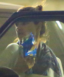 PREMIUM EXCLUSIVE Alessandra Ambrosio munches on greasy chips