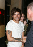 LOUIS TOMLINSON LEAVING CIRQUE LE SOIR NIGHTCLUB IN LONDON