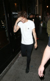 LOUIS TOMLINSON LEAVING CIRQUE LE SOIR NIGHTCLUB IN LONDON