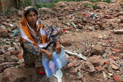 Relatives of the dead and missing visit the site of the Rana Plaza building