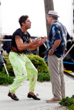 Zac Efron flexes his muscles to Robert De Niro on "Dirty Grandpa"