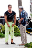 Zac Efron flexes his muscles to Robert De Niro on "Dirty Grandpa"