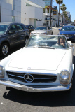 *EXCLUSIVE* Harry Styles looks cool driving white vintage Mercedes Benz
