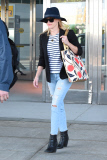 Reese Witherspoon is a trendy beauty as she arrives at JFK