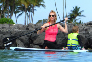 Exclusive... January Jones Takes Her Son Paddle-Boarding In Hawaii - NO INTERNET USE WITHOUT PRIOR AGREEMENT 