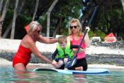 Exclusive... January Jones Takes Her Son Paddle-Boarding In Hawaii - NO INTERNET USE WITHOUT PRIOR AGREEMENT 