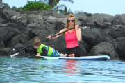Exclusive... January Jones Takes Her Son Paddle-Boarding In Hawaii - NO INTERNET USE WITHOUT PRIOR AGREEMENT 