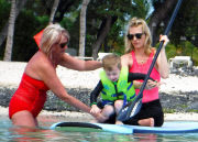 Exclusive... January Jones Takes Her Son Paddle-Boarding In Hawaii - NO INTERNET USE WITHOUT PRIOR AGREEMENT 