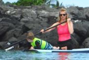 Exclusive... January Jones Takes Her Son Paddle-Boarding In Hawaii - NO INTERNET USE WITHOUT PRIOR AGREEMENT 