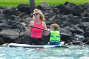 Exclusive... January Jones Takes Her Son Paddle-Boarding In Hawaii - NO INTERNET USE WITHOUT PRIOR AGREEMENT 