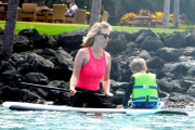 Exclusive... January Jones Takes Her Son Paddle-Boarding In Hawaii - NO INTERNET USE WITHOUT PRIOR AGREEMENT 