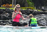 Exclusive... January Jones Takes Her Son Paddle-Boarding In Hawaii - NO INTERNET USE WITHOUT PRIOR AGREEMENT 