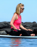 Exclusive... January Jones Takes Her Son Paddle-Boarding In Hawaii - NO INTERNET USE WITHOUT PRIOR AGREEMENT 