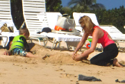 Exclusive... January Jones Takes Her Son Paddle-Boarding In Hawaii - NO INTERNET USE WITHOUT PRIOR AGREEMENT 