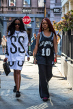 Redhead Rihanna shows her love for the San Antonio Spurs while in NY