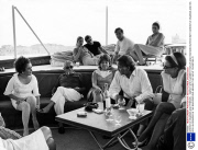 ARISTOTLE ONASSIS AND FRIENDS -  MARCH 1975