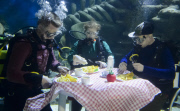Underwater 'Fish Supper' announcing sustainable fish week at the Sea Life London Aquarium, Britain - 14 May 2015