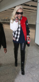 RITA ORA ARRIVES AT LONDON'S HEATHROW AIRPORT