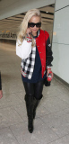 RITA ORA ARRIVES AT LONDON'S HEATHROW AIRPORT