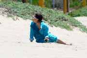 *EXCLUSIVE* Lady Gaga takes care of business on the beach