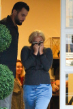 Lady Gaga covers up after a cosmetic laser treatment appointment
