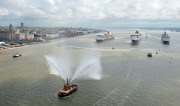 Cunard's Three Queens sail down Mersey, Liverpool, Britain - 25 May 2015