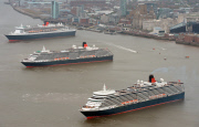 Cunard's Three Queens sail down Mersey, Liverpool, Britain - 25 May 2015