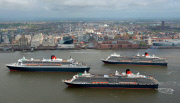 Cunard's Three Queens sail down Mersey, Liverpool, Britain - 25 May 2015