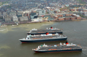 Cunard's Three Queens sail down Mersey, Liverpool, Britain - 25 May 2015