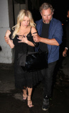 Jessica Simpson gets a helping hand from husband Eric at Sayers Club