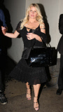 Jessica Simpson gets a helping hand from husband Eric at Sayers Club