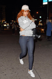 Rihanna dresses down in hooded pullover and skinny jeans at Game nightclub