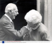 President George Bush's Wife Barbara Kisses Denis Thatcher's Hand At Number 10 Downing Street Returning A Compliment When He Welcomed Her.