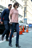 Dakota Johnson sips an iced coffee on the set of 'How To Be Single'