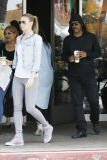 Paige Butcher and Eddie Murphy get a daily dose of caffeine at Starbucks