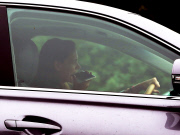 PREMIUM EXCLUSIVE Katie Holmes chatting on the phone while driving