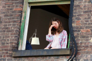 Alison Brie gets animated outside a Window for "How to Be Single" - Part 2
