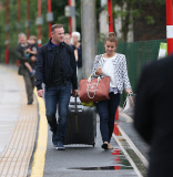 FAMEFLYNET - Wayne And Coleen Rooney Look Very Happy As They Arrive Back In Cheshire From Friends Wedding