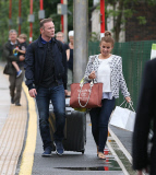 FAMEFLYNET - Wayne And Coleen Rooney Look Very Happy As They Arrive Back In Cheshire From Friends Wedding