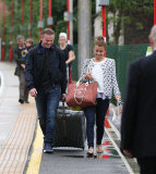FAMEFLYNET - Wayne And Coleen Rooney Look Very Happy As They Arrive Back In Cheshire From Friends Wedding