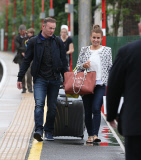 FAMEFLYNET - Wayne And Coleen Rooney Look Very Happy As They Arrive Back In Cheshire From Friends Wedding