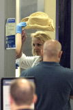 Britney Spears humbled by strict airport security at LAX **NO UK**